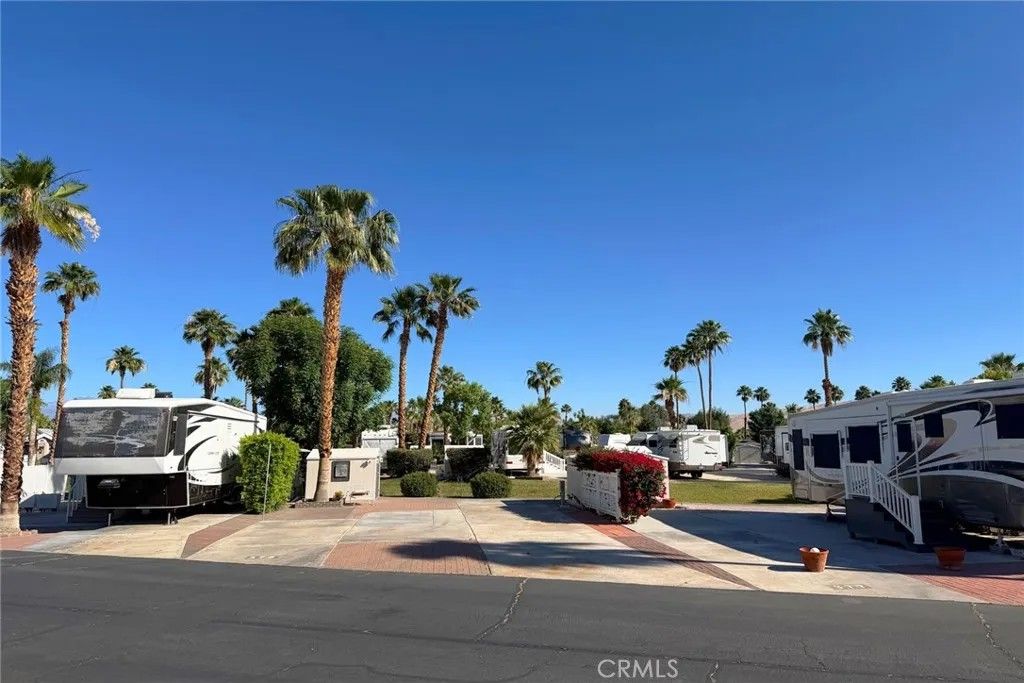 Photo of 69801 Ramon Rd, Cathedral City, CA 92234 (MLS # OC26095507)