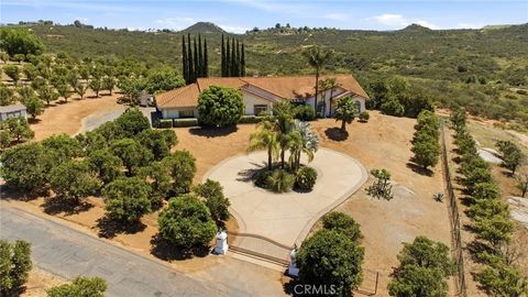 Photo of 30401 Cool Valley Highlands RD, Valley Center, CA 92082 (MLS # SW26105190)
