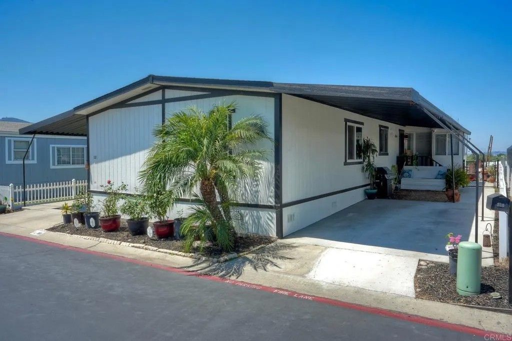 Photo of 500 Rancheros Drive #SPC 181, San Marcos, CA 92069 (MLS # NDP2506778)