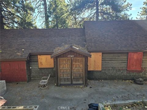 Photo of 31845 Hilltop Dr, Running Springs, CA 92382 (MLS # IG25277008)