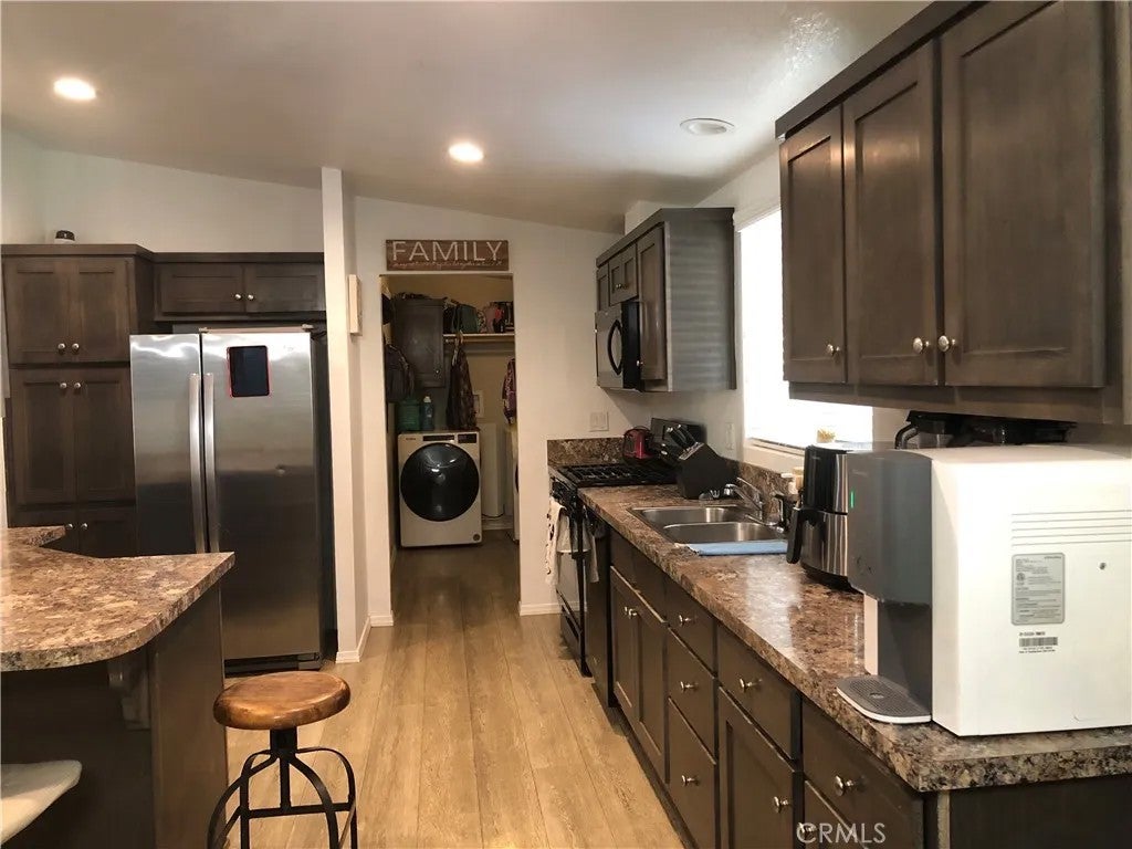 Photo of 4901 Green River #292, Corona, CA 92878 (MLS # PW26017994)