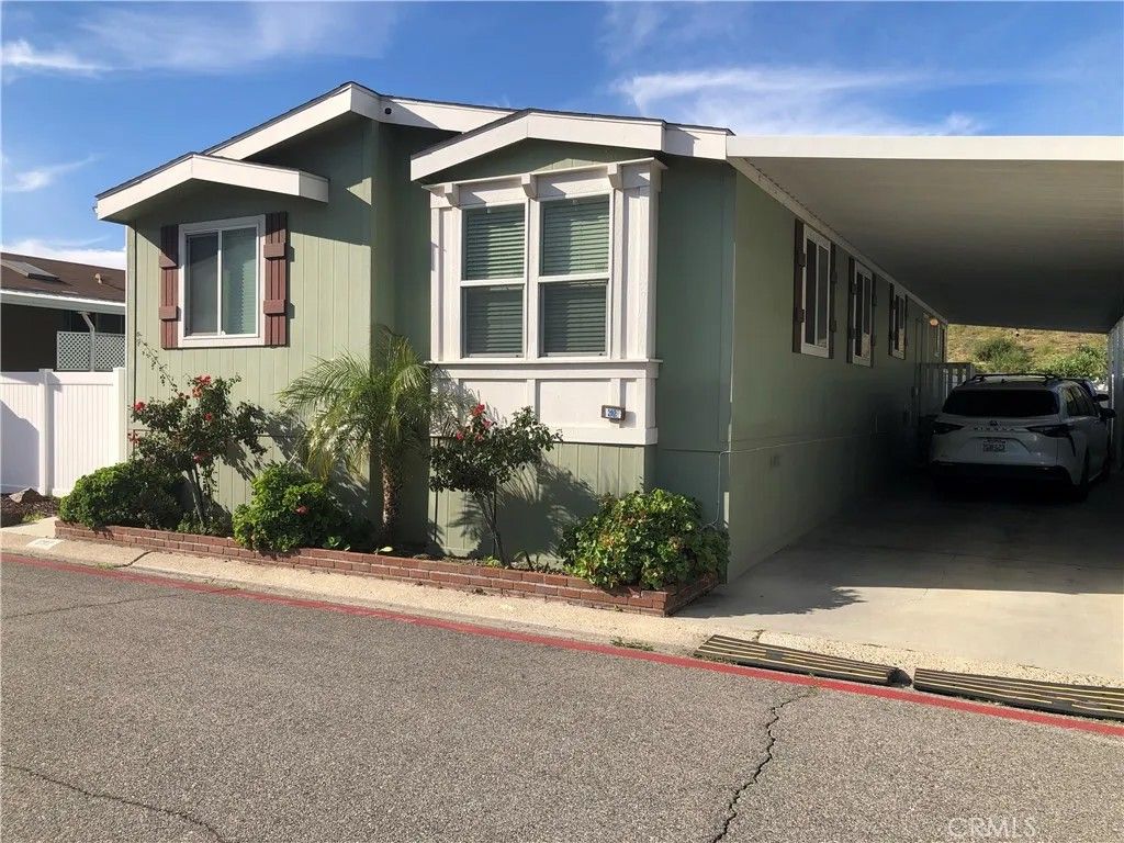 Photo of 4901 Green River #292, Corona, CA 92878 (MLS # PW26017994)
