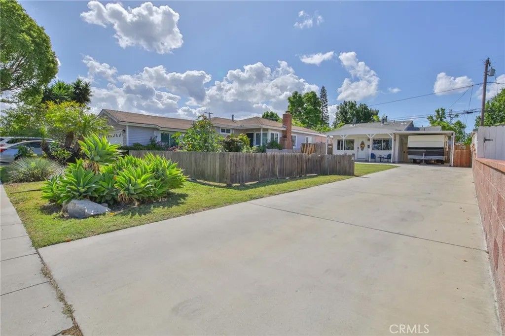 Photo of 1404 E Michelson St, Long Beach, CA 90805 (MLS # RS26092779)