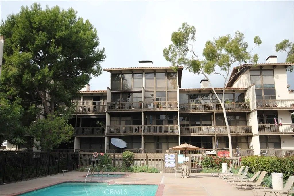 Photo of 6318 Marina Pacifica Drive, Long Beach, CA 90803 (MLS # PW26086037)