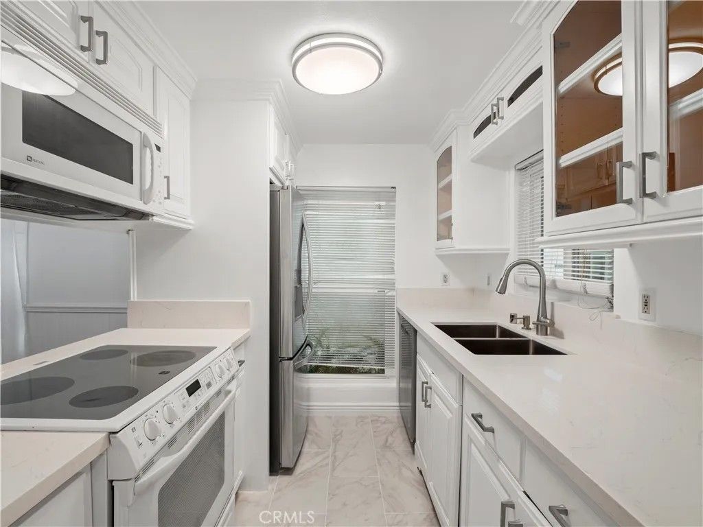 Photo of 18411 Hatteras Street #138, Tarzana, CA 91356 (MLS # SR26072361)