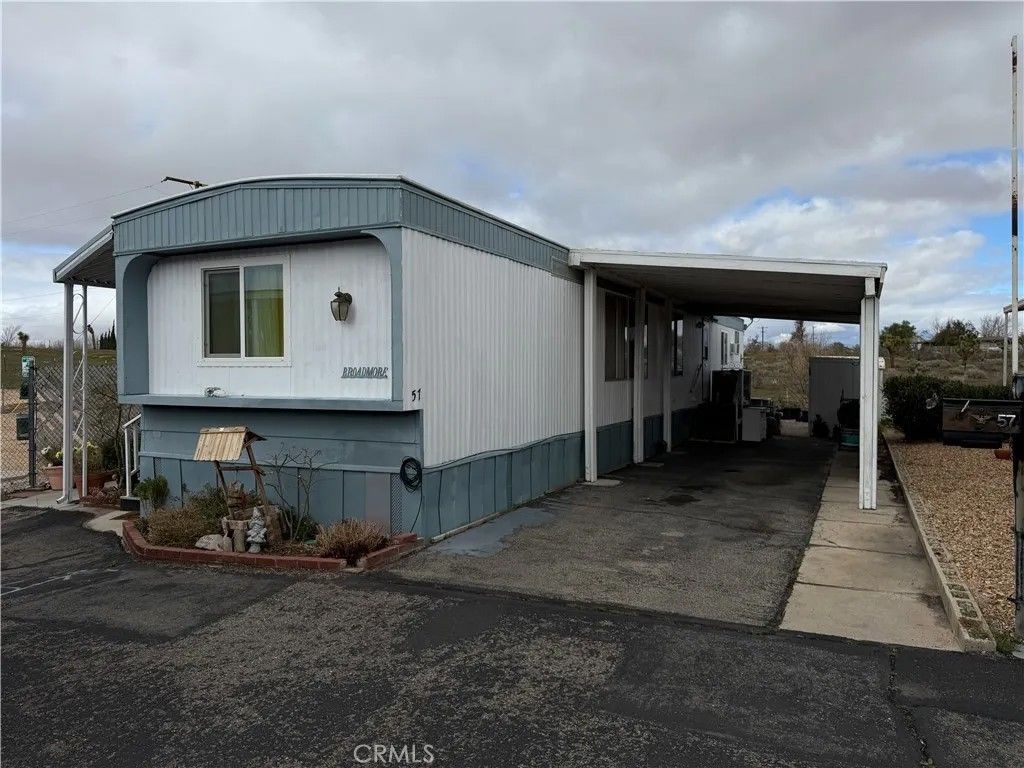 Photo of 11414 Serra Rd #57, Apple Valley, CA 92308 (MLS # HD26031593)