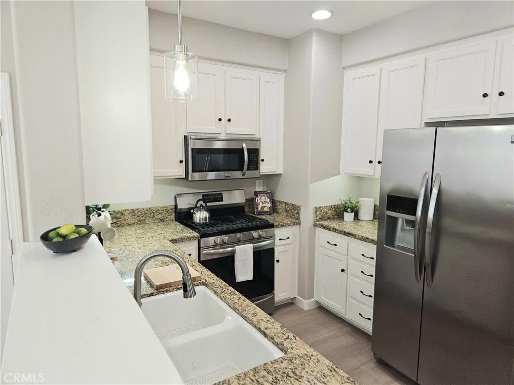 Photo of 41764 Ridgewalk St #3, Murrieta, CA 92562 (MLS # OC26084541)