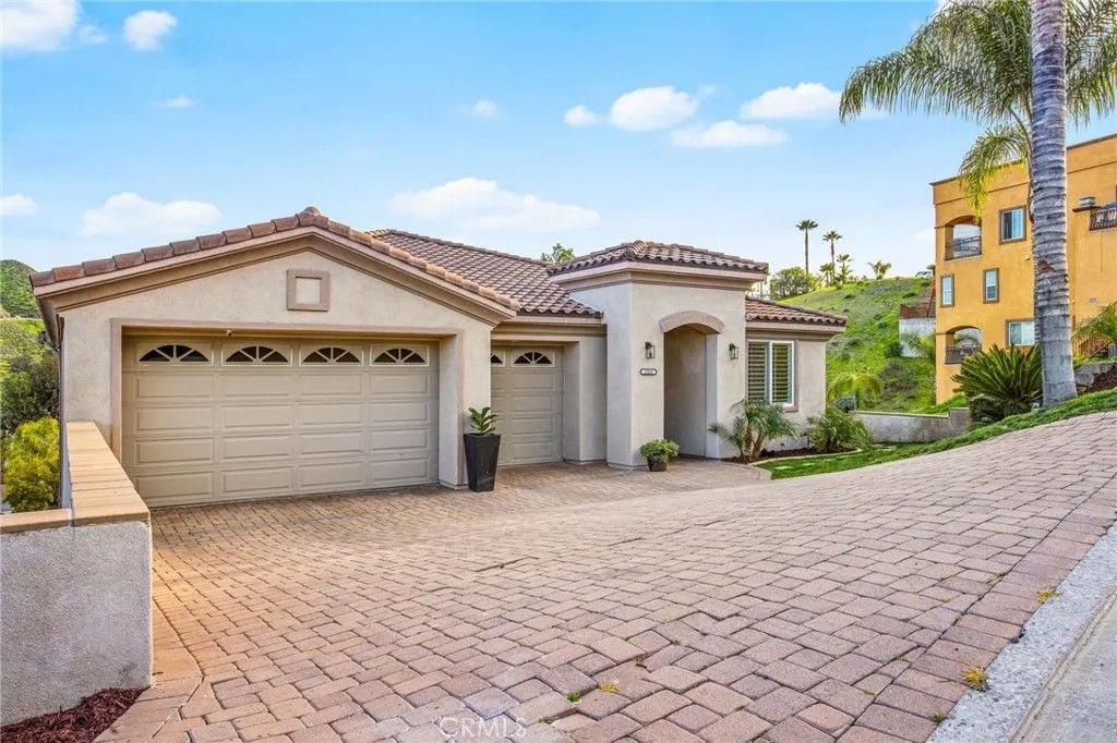 Photo of 22883 Giant Fir Pl, Canyon Lake, CA 92587 (MLS # SW26017068)