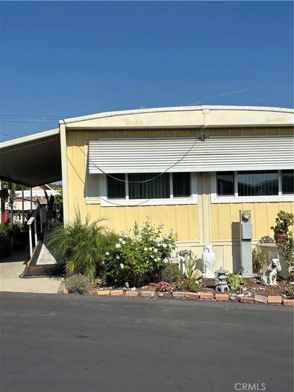 Photo of 301 E Foothill Blvd #24, Pomona, CA 91767 (MLS # CV25272296)