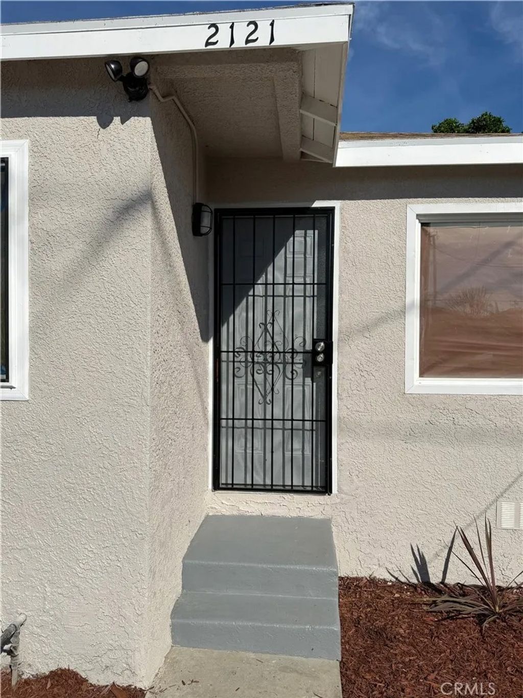 Photo of 2121 E Piru St, Compton, CA 90222 (MLS # DW26044112)