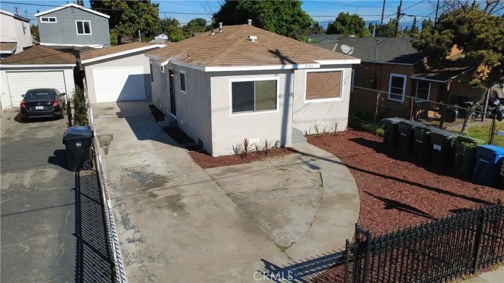 Photo of 2121 E Piru St, Compton, CA 90222 (MLS # DW26044112)