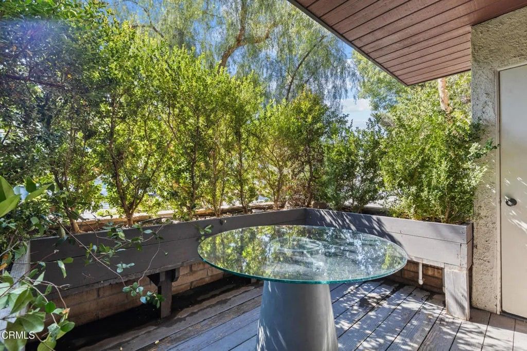 Photo of 21931 Burbank Boulevard #5, Los Angeles, CA 91367 (MLS # P1-25532)