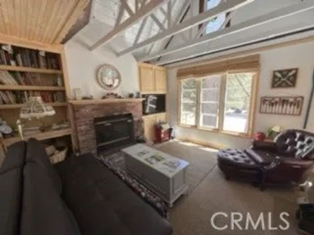 Photo of 658 Yukon Dr, Green Valley Lake, CA 92341 (MLS # IV26085064)