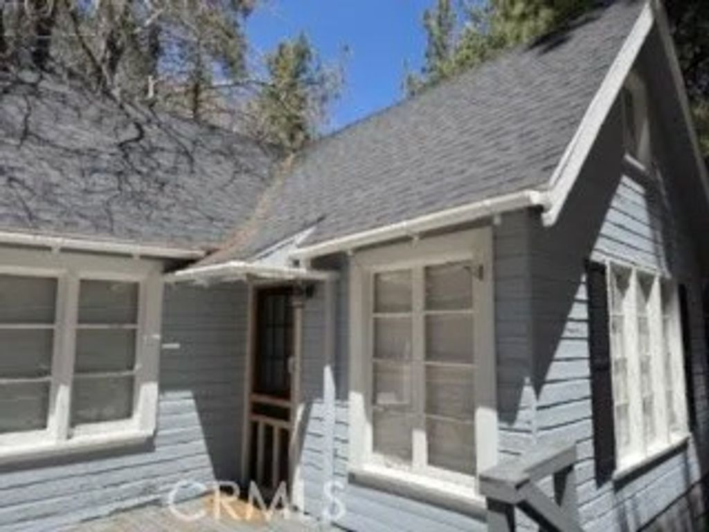 Photo of 658 Yukon Dr, Green Valley Lake, CA 92341 (MLS # IV26085064)