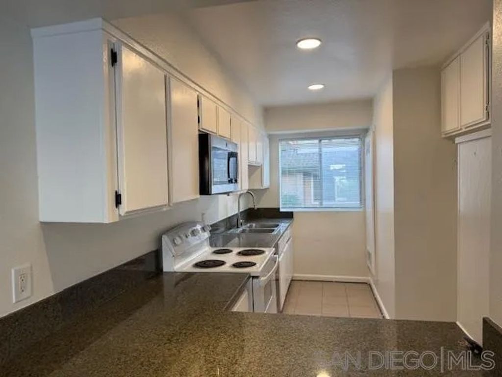 Photo of 647 Beverly Pl, San Marcos, CA 92078 (MLS # 250043672)