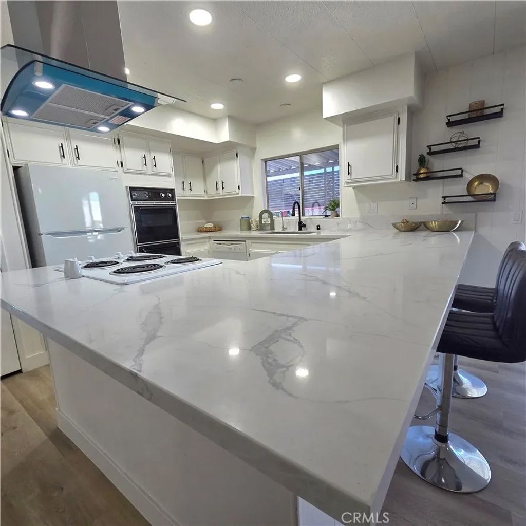 Photo of 30930 Paradise Palm Ave, Homeland, CA 92548 (MLS # HD26025462)