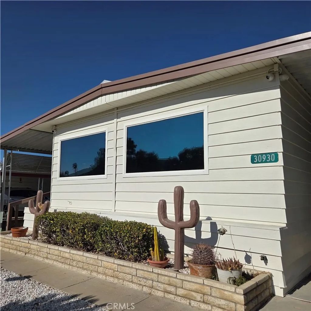 Photo of 30930 Paradise Palm Ave, Homeland, CA 92548 (MLS # HD26025462)