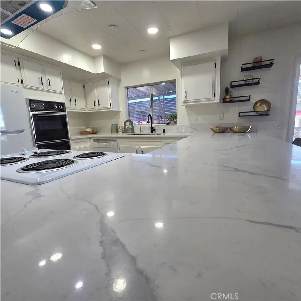 Photo of 30930 Paradise Palm Ave, Homeland, CA 92548 (MLS # HD26025462)