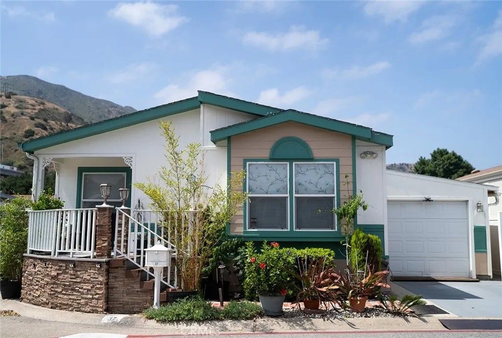Photo of 4901 Green River #37 RD, Corona, CA 92878 (MLS # OC26095901)