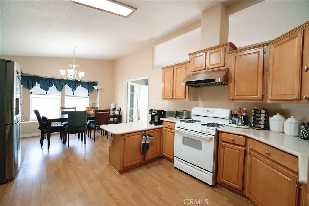 Photo of 4901 Green River #37 RD, Corona, CA 92878 (MLS # OC26095901)