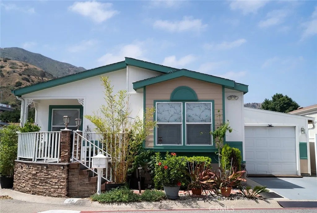 Photo of 4901 Green River #37 RD, Corona, CA 92878 (MLS # OC26095901)