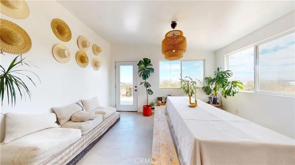 Photo of 1271 Dakota Ln, Landers, CA 92285 (MLS # JT25246931)