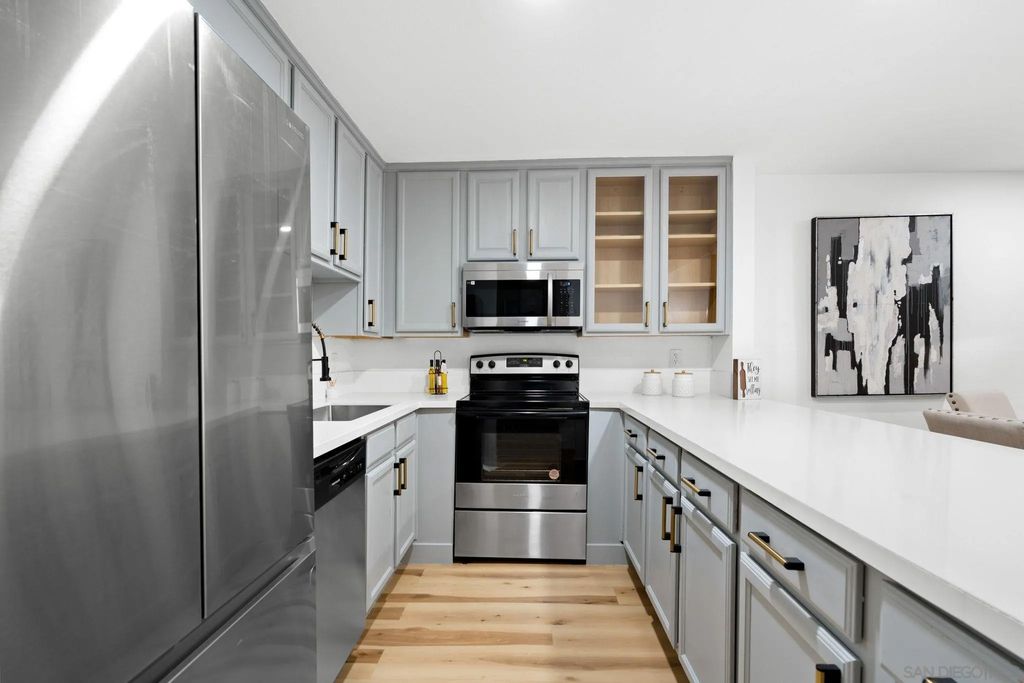 Photo of 3030 Suncrest Dr #104, San Diego, CA 92116 (MLS # 260004279)