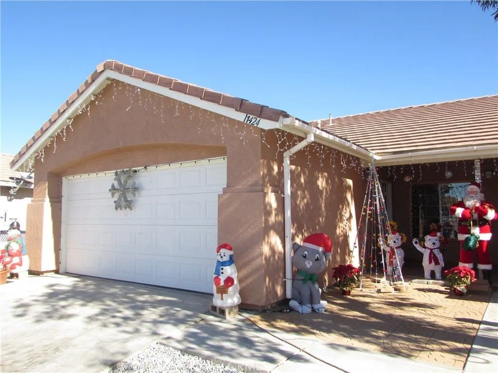 Photo of 11424 Dartmouth Court, Adelanto, CA 92301 (MLS # MB25277112)