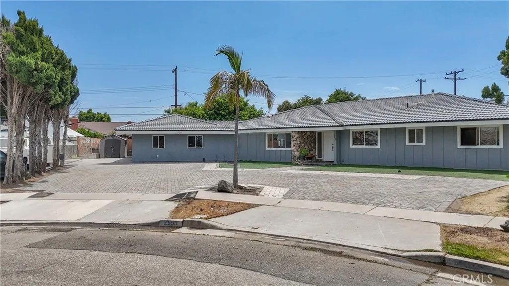 Photo of 2550 W Rowland Avenue, Anaheim, CA 92804 (MLS # PW26036099)