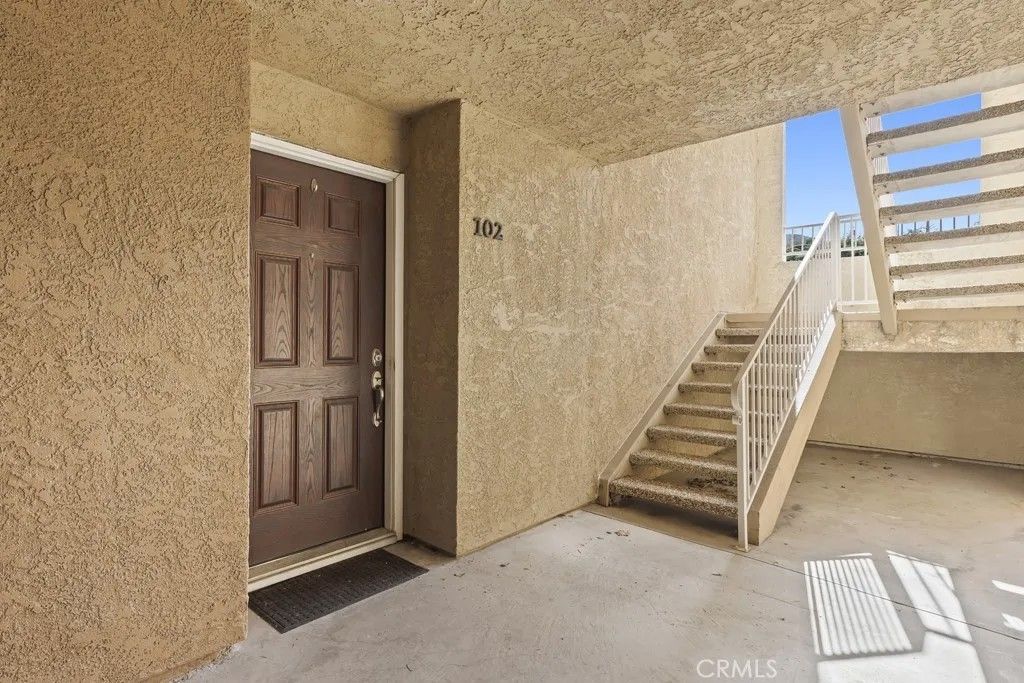 Photo of 2320 Del Mar Way #102, Corona, CA 92882 (MLS # CV26025630)