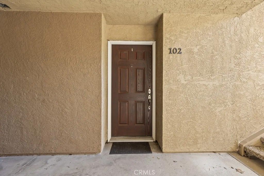 Photo of 2320 Del Mar Way #102, Corona, CA 92882 (MLS # CV26025630)