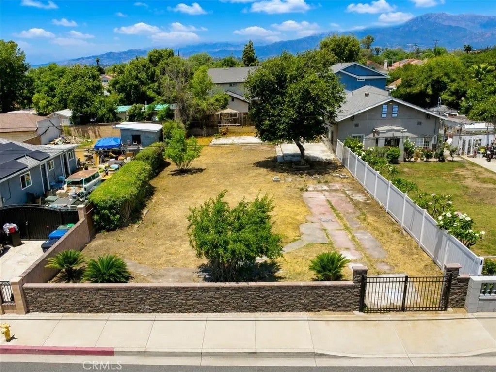 Photo of 949 W Grand Ave, Pomona, CA 91766 (MLS # DW26133868)