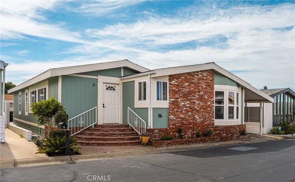 Photo of 23301 Ridge Route Dr #56, Laguna Hills, CA 92653 (MLS # OC26042583)