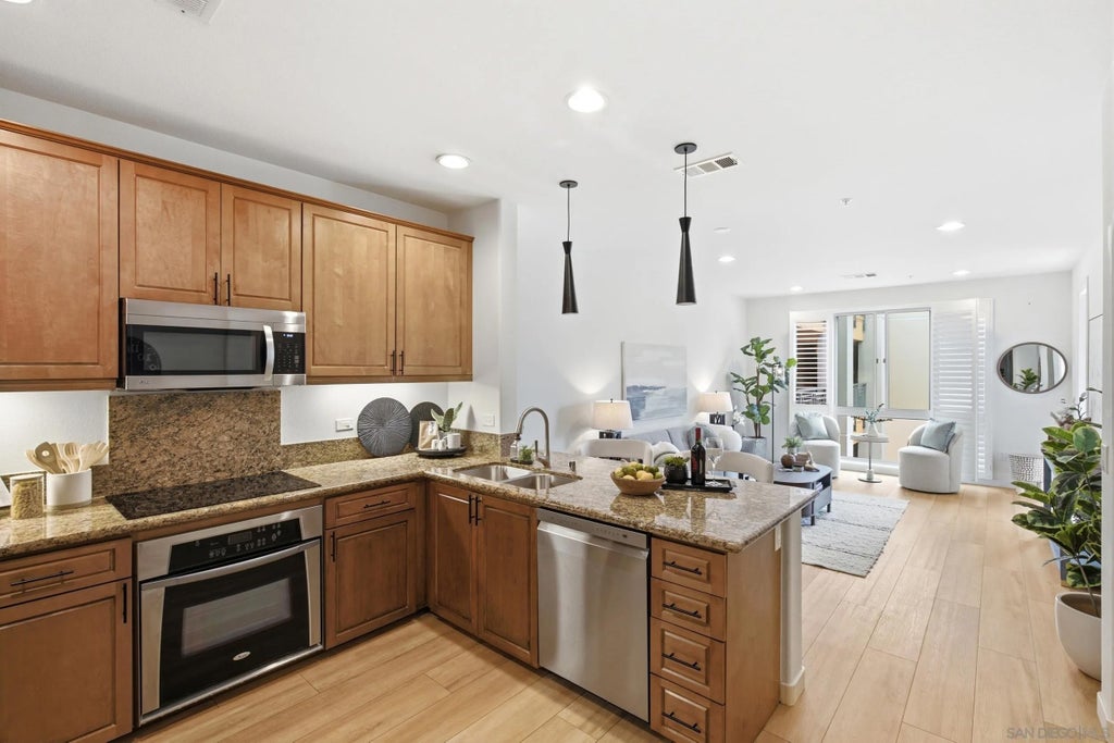 Photo of 3887 Pell Pl #325, San Diego, CA 92130 (MLS # 260019220)