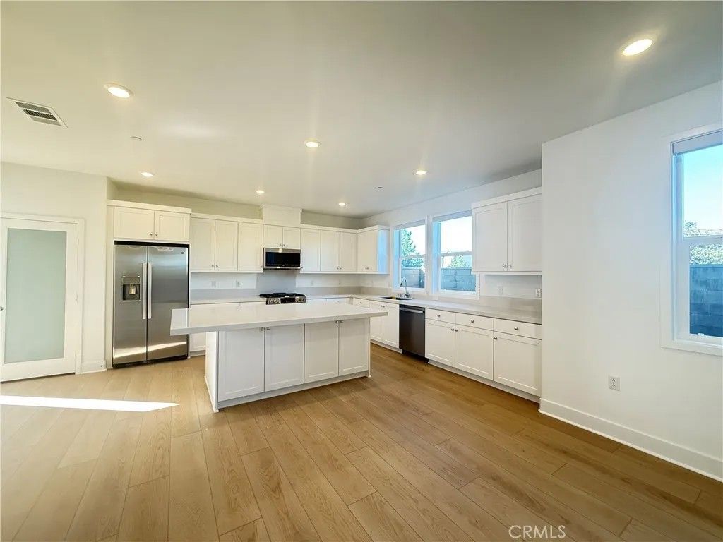 Photo of 313 Proctor, Irvine, CA 92618 (MLS # OC26012471)