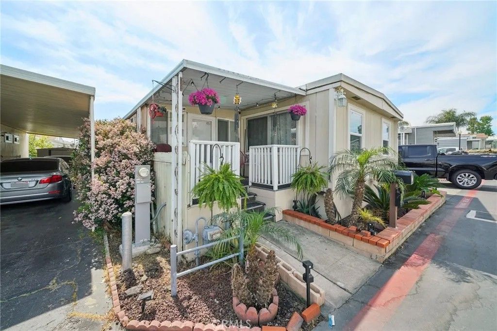 Photo of 8389 Baker Ave #29, Rancho Cucamonga, CA 91730 (MLS # CV26063505)