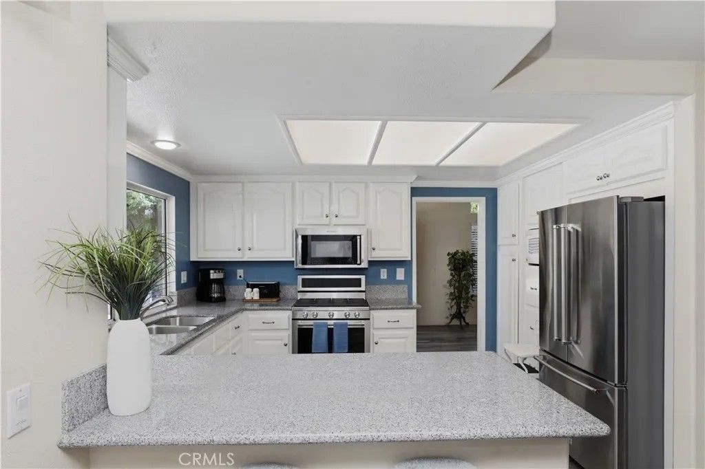 Photo of 16350 Blossom Time Court, Riverside, CA 92503 (MLS # OC26080464)