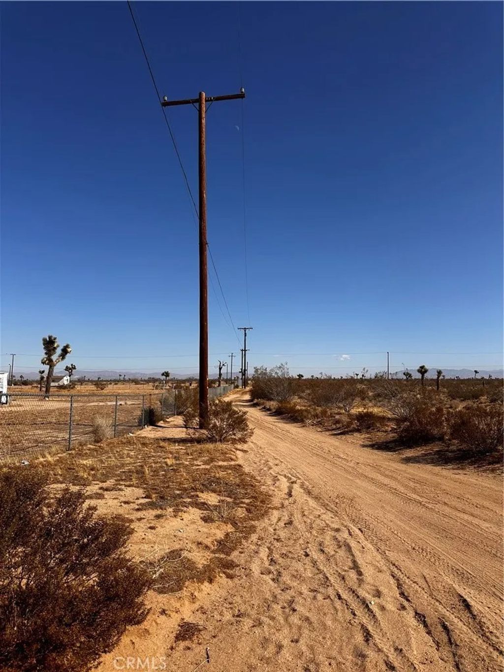 Photo of 7625 Luna Rd, Phelan, CA 92371 (MLS # CV26011581)