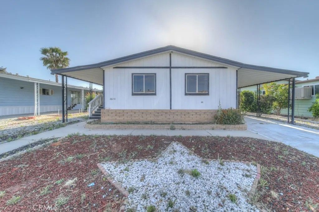 Photo of 26151 Kentia Palm Drive, Homeland, CA 92548 (MLS # SW26096947)