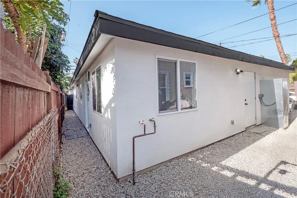 Photo of 5739 S St Andrews Pl, Los Angeles, CA 90062 (MLS # DW26052363)