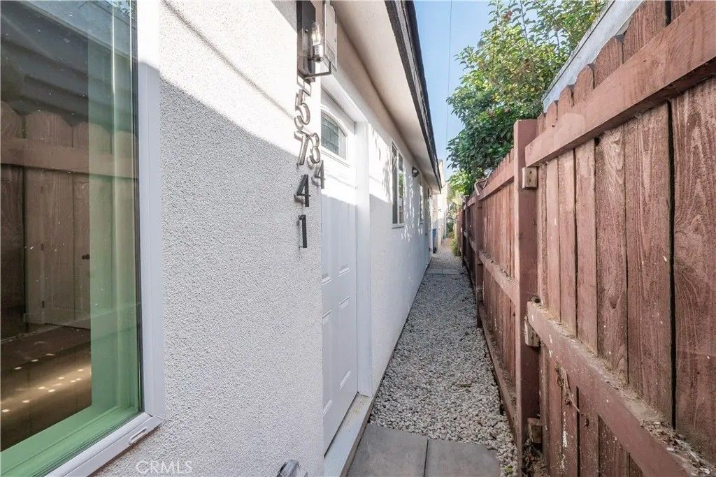 Photo of 5739 S St Andrews Pl, Los Angeles, CA 90062 (MLS # DW26052363)