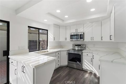 Photo of 9873 Karmont Ave, South Gate, CA 90280 (MLS # OC25275727)