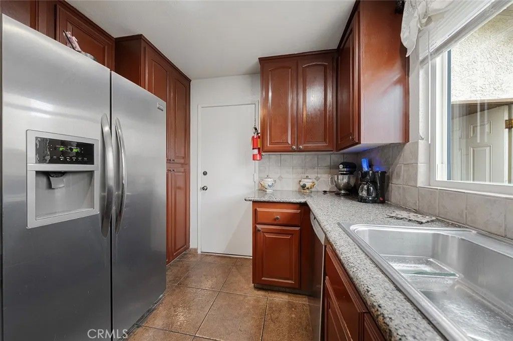 Photo of 15465 Raymond Avenue, Fontana, CA 92336 (MLS # CV26033861)