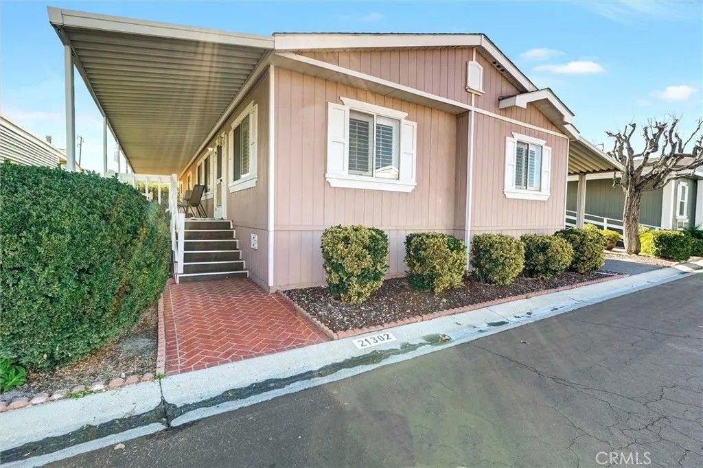 Photo of 21302 Blue Curl Way, Canyon Country, CA 91351 (MLS # IG26083648)