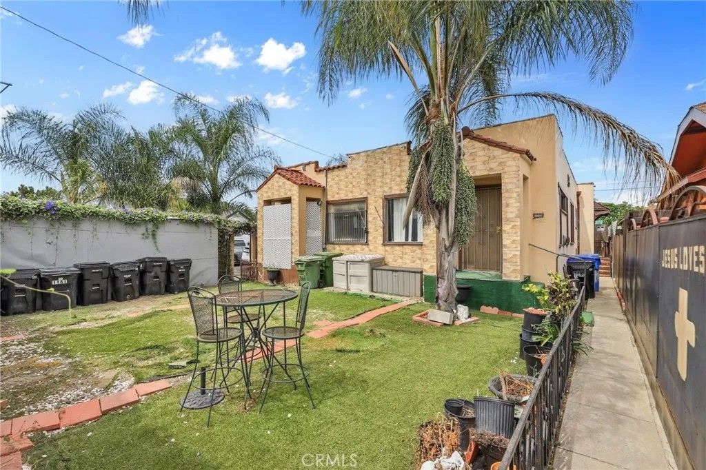 Photo of 1159 W 54th Street, Los Angeles, CA 90037 (MLS # PW26069475)