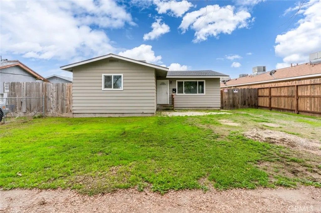 Photo of 92 E 12th St, Merced, CA 95341 (MLS # MC25282003)