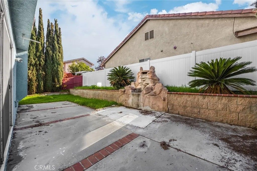 Photo of 16615 Windcrest Dr, Fontana, CA 92337 (MLS # PW25280465)