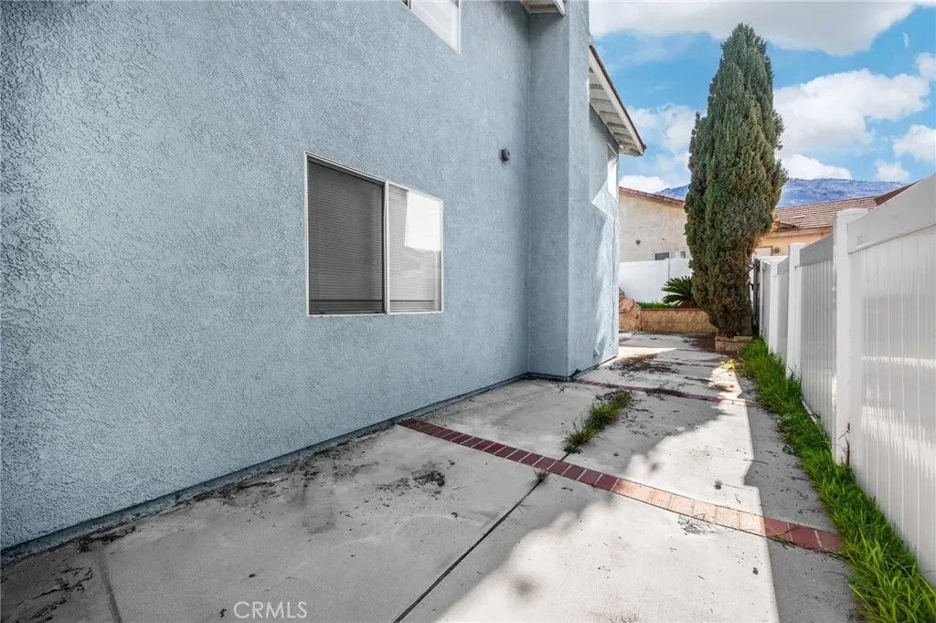 Photo of 16615 Windcrest Dr, Fontana, CA 92337 (MLS # PW25280465)