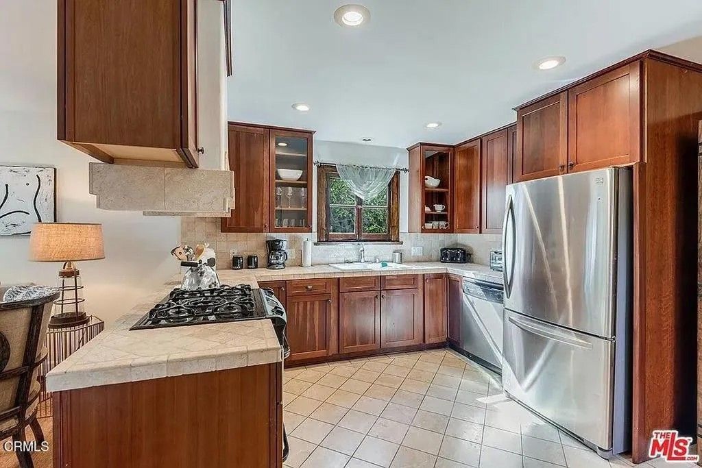 Photo of 835 N Sycamore Avenue, Los Angeles, CA 90038 (MLS # P1-25869)