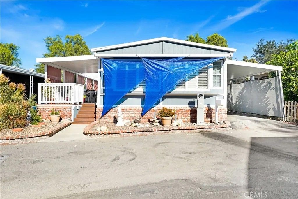 Photo of 4201 Topanga Canyon Blvd #147, Woodland Hills, CA 91364 (MLS # SR25277592)